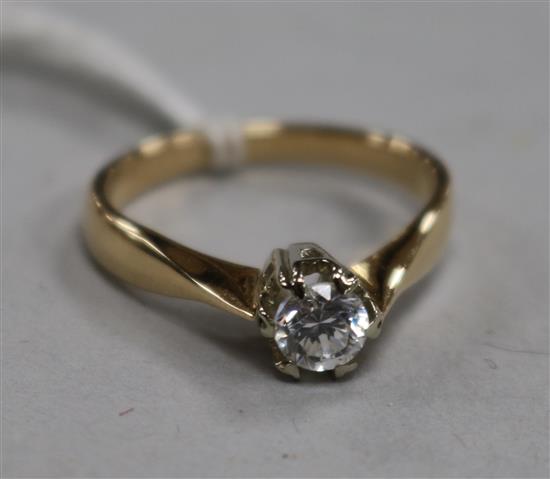 A gold and solitaire diamond ring, size L.